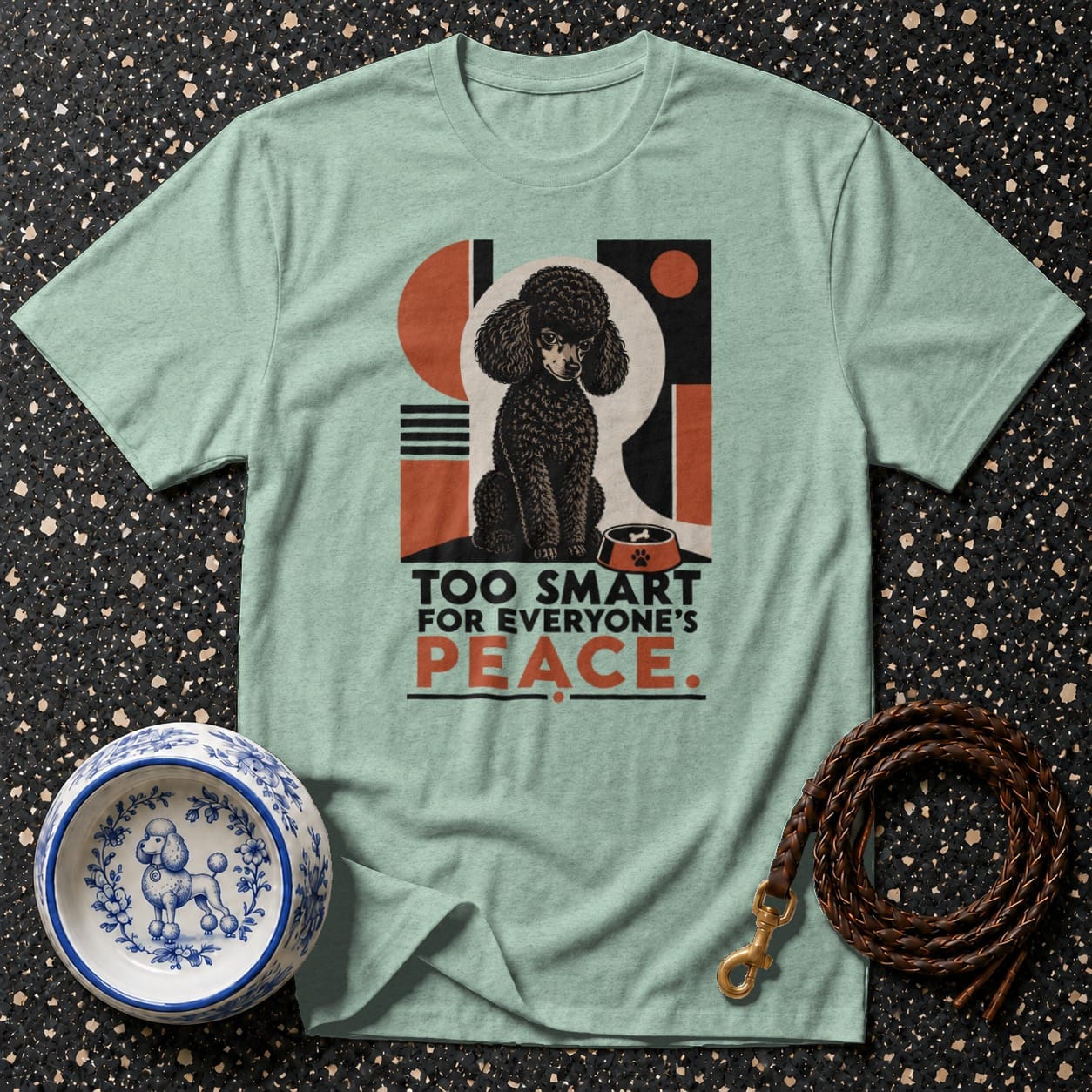 Light teal t-shirt with a black poodle illustration and text "TOO SMART FOR EVERYONE'S PEACE."