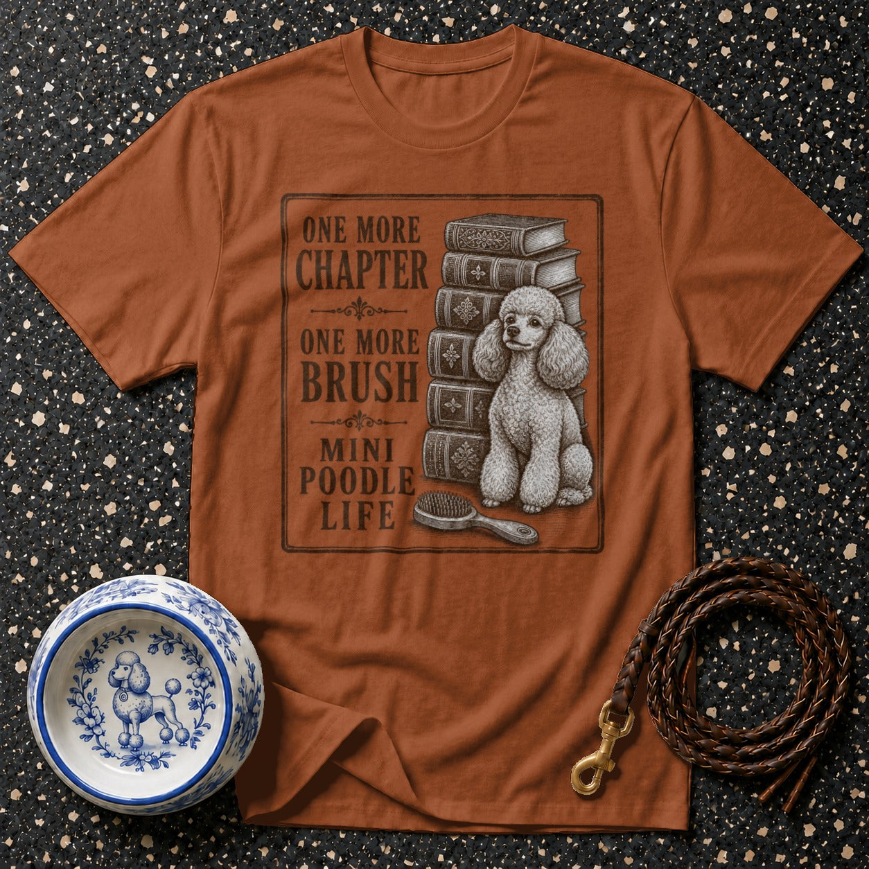 T-shirt with 'One More Chapter, One More Brush, Mini Poodle Life' text and poodle illustration.