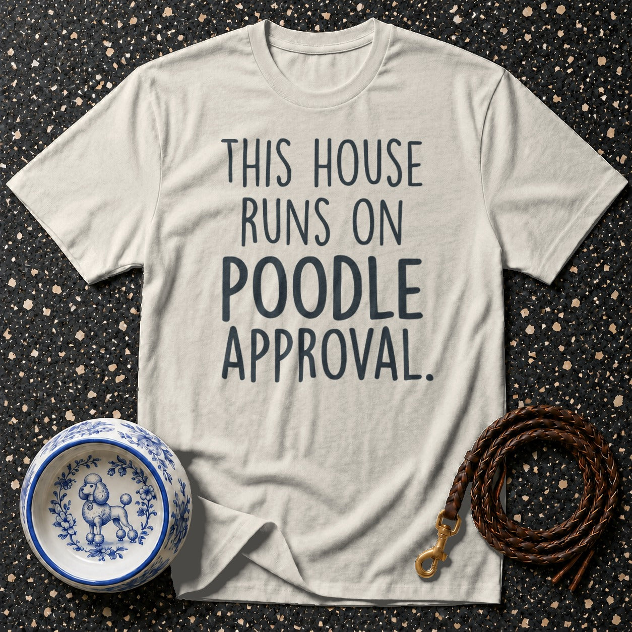 T-shirt with "This House Runs On Poodle Approval" text, dog bowl, and leash.