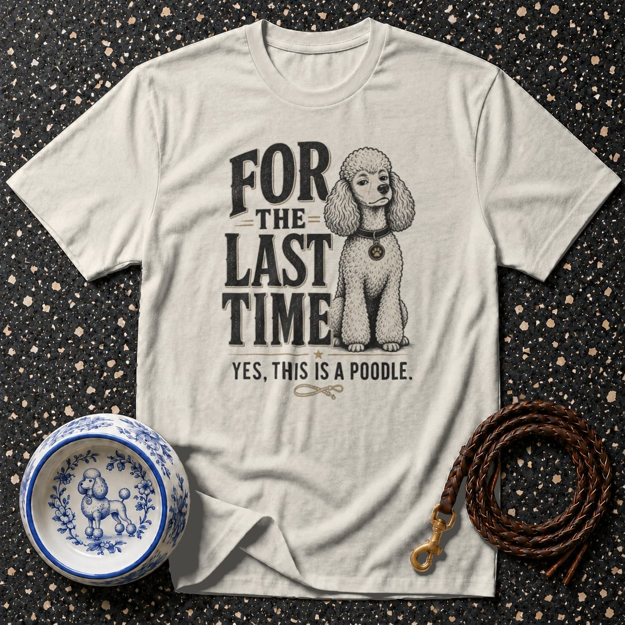 T-shirt with a poodle illustration and text that reads "FOR THE LAST TIME YES, THIS IS A POODLE."