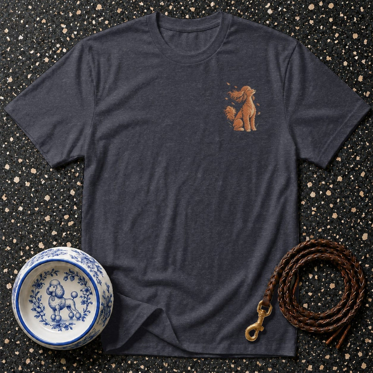 Dark gray t-shirt with embroidered apricot poodle graphic on left chest.