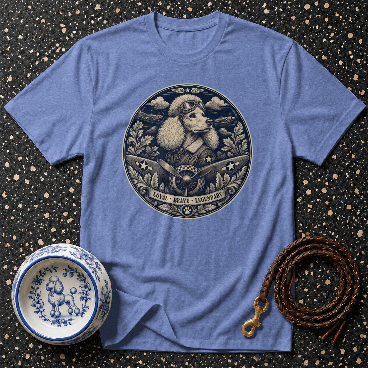 Poodle pilot illustration with "Loyal Brave Legendary" text on a blue t-shirt.
