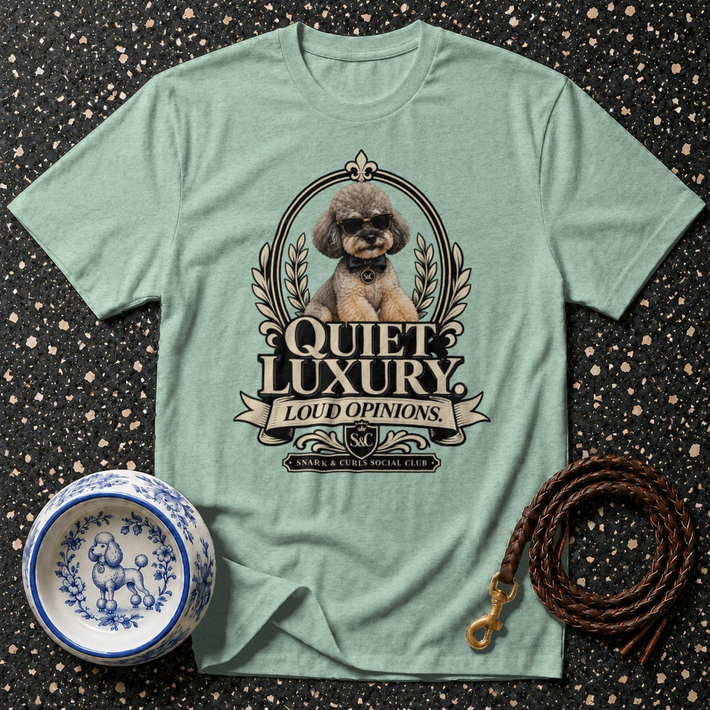 Light blue t-shirt with dog graphic: "Quiet Luxury, Loud Opinions."