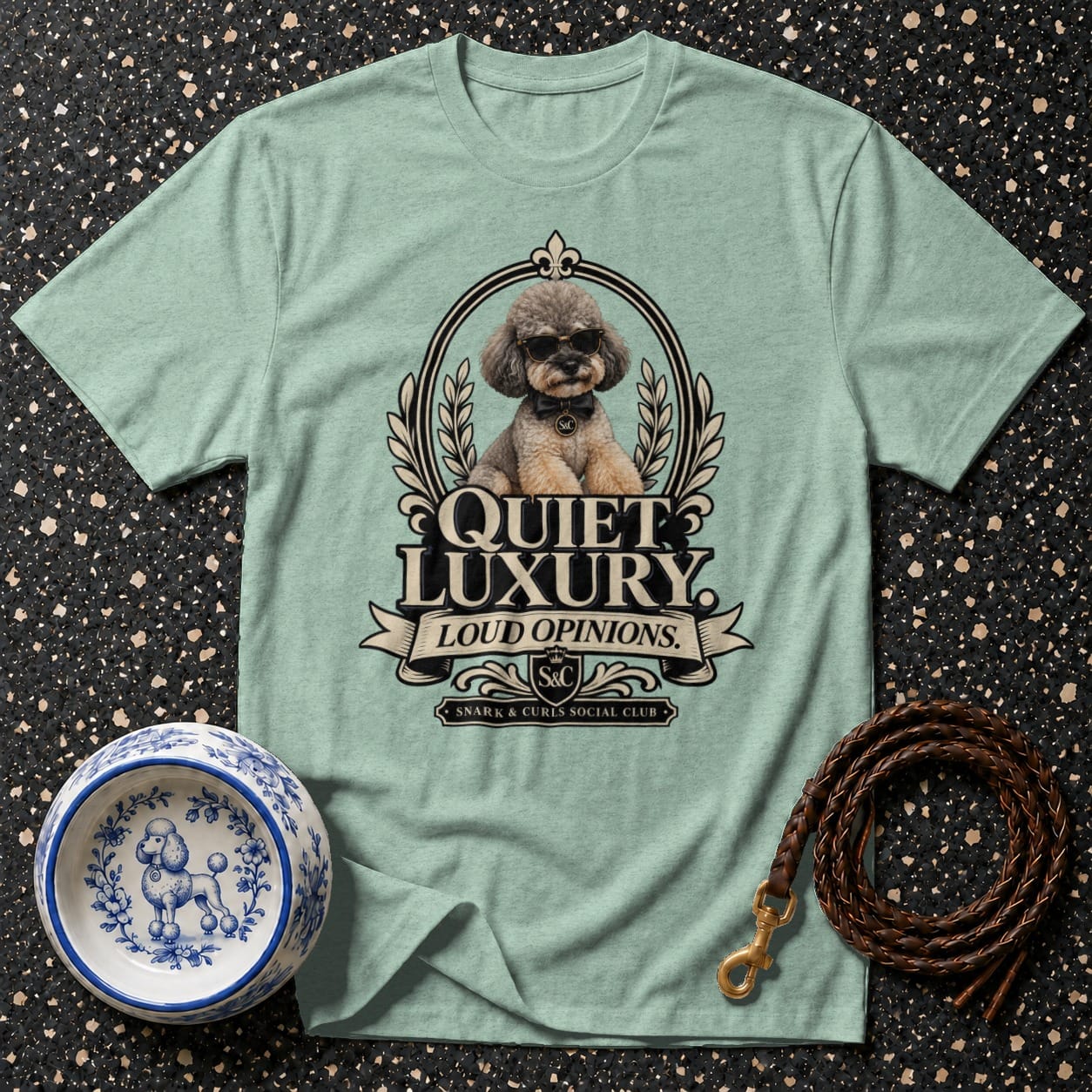 Light blue t-shirt with dog graphic: "Quiet Luxury, Loud Opinions."