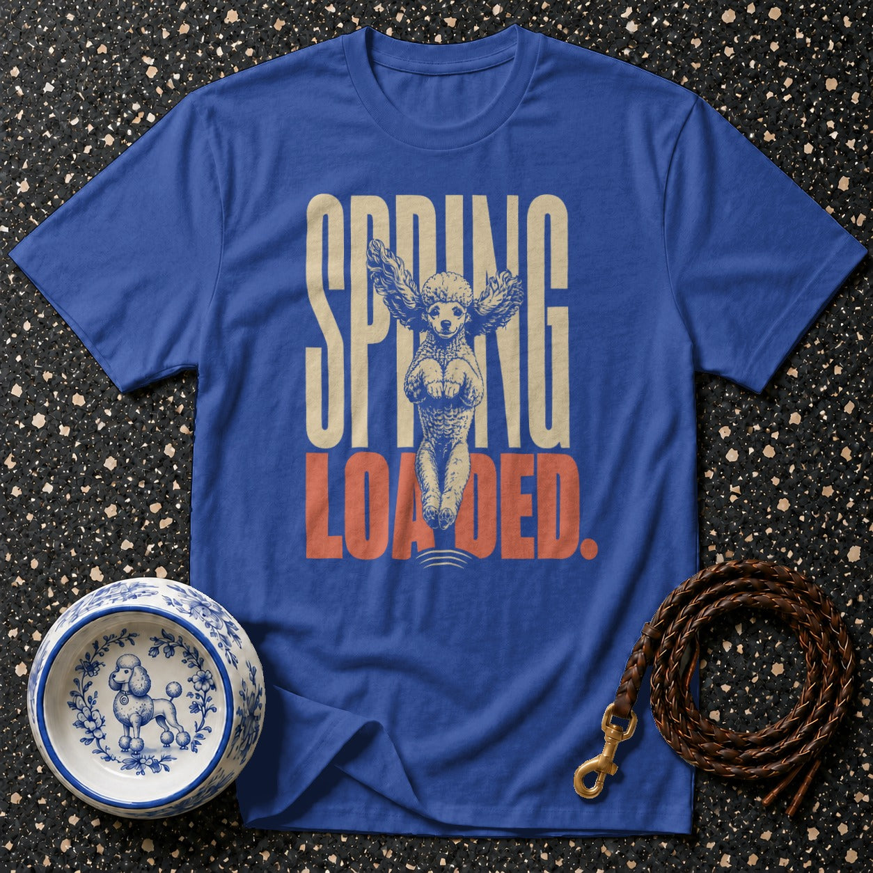 Blue t-shirt with poodle graphic and text "SPRING LOADED".