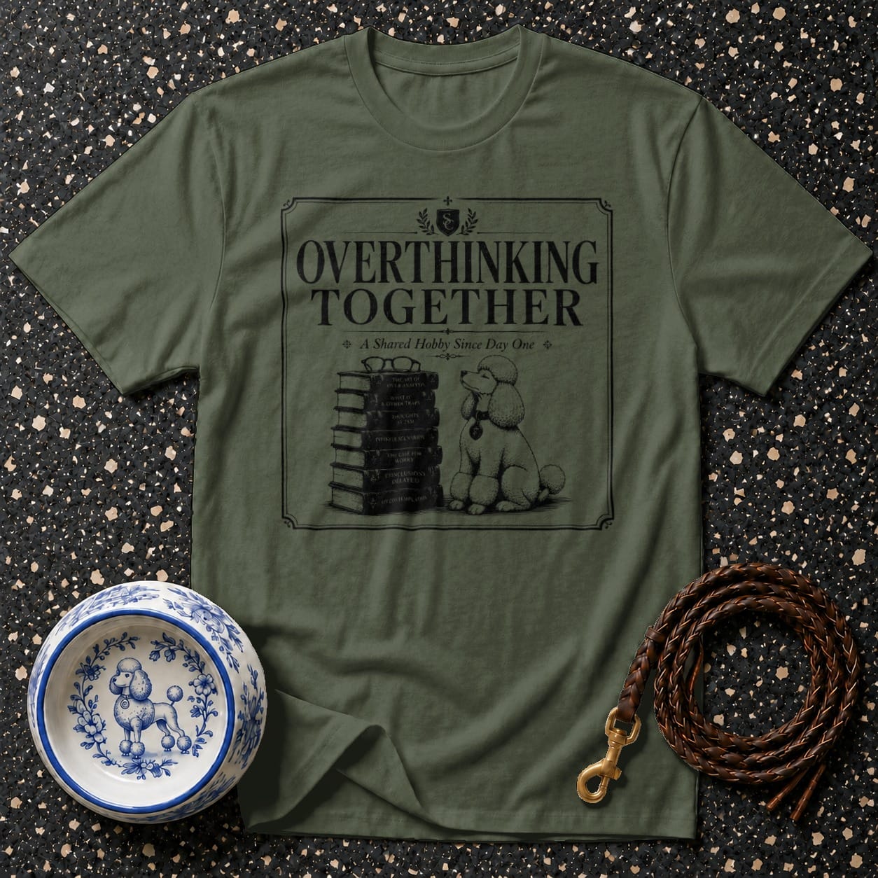 Olive green t-shirt with "Overthinking Together A Shared Hobby Since Day One" text and poodle illustration.