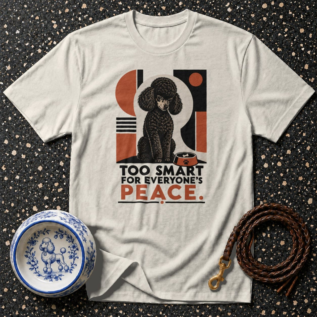 Cream t-shirt with graphic of black poodle, bowl, and text "TOO SMART FOR EVERYONE'S PEACE."