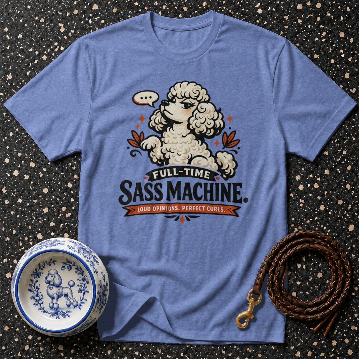 Blue t-shirt with a cartoon poodle and the text "FULL-TIME SASS MACHINE. LOUD OPINIONS. PERFECT CURLS."