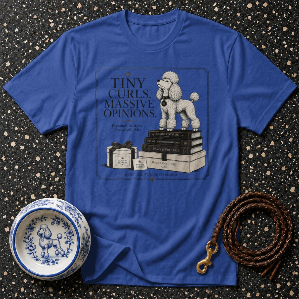 Blue t-shirt with a white poodle standing on books and text.
