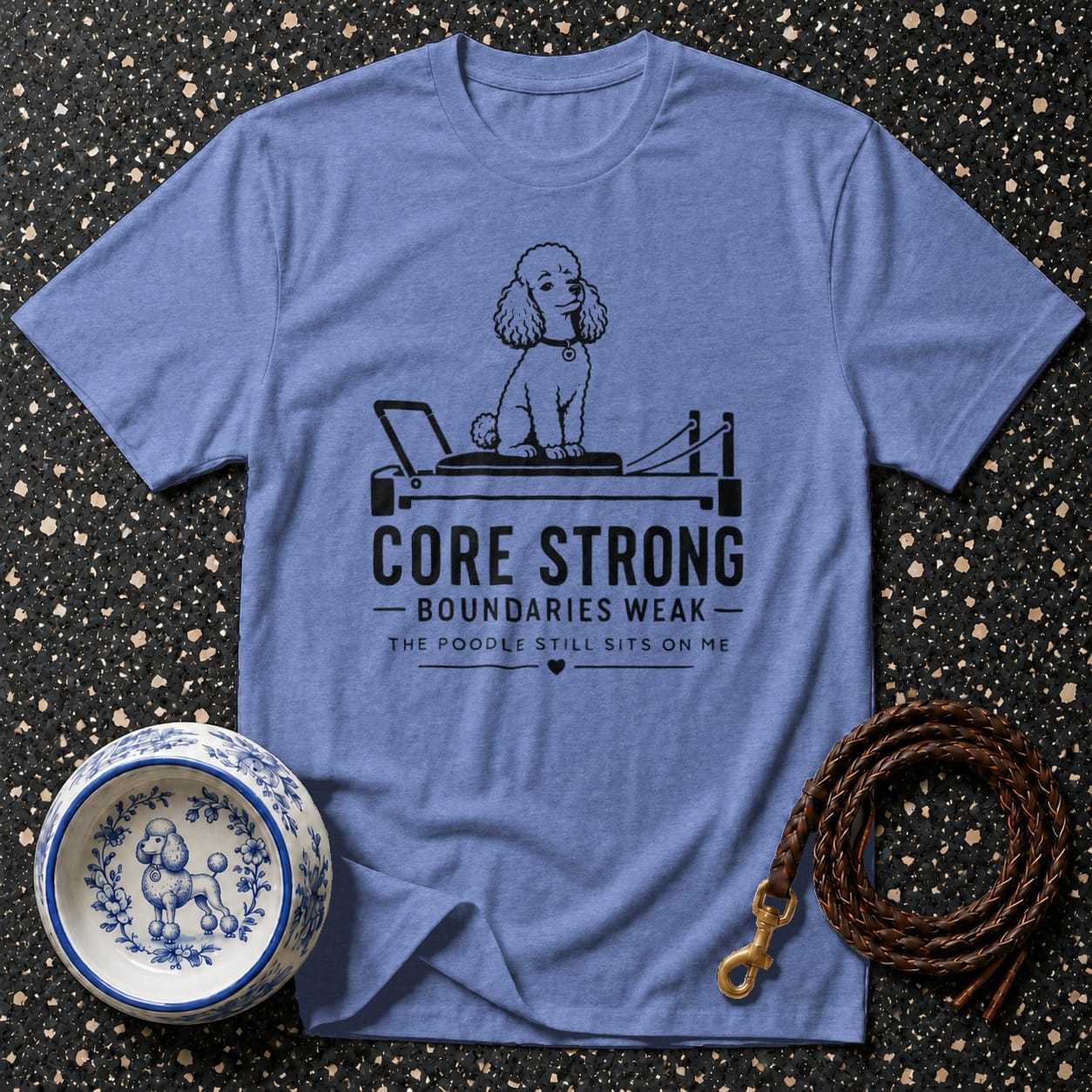 Blue t-shirt with "CORE STRONG BOUNDARIES WEAK THE POODLE STILL SITS ON ME" text and poodle graphic.