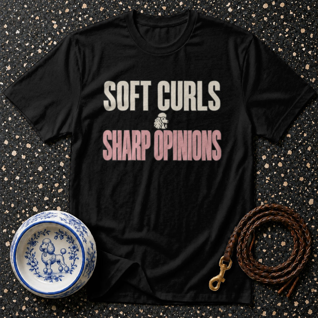 Black t-shirt with text "SOFT CURLS SHARP OPINIONS" and a poodle graphic.