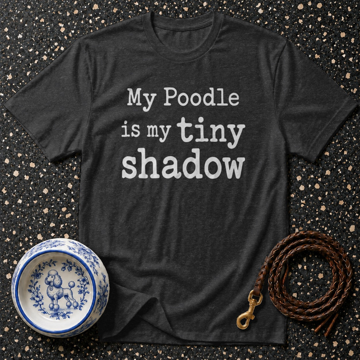 Dark gray t-shirt with white text reading "My Poodle is my tiny shadow".