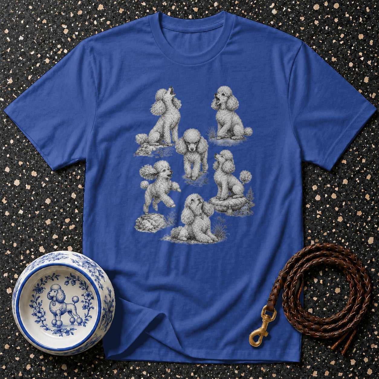 Royal blue t-shirt with an all-over sketch print of seven poodles in various poses.