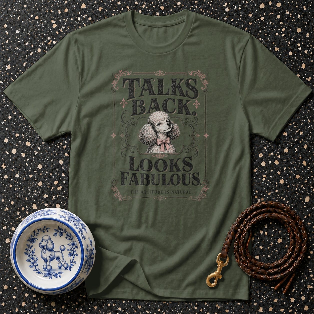 Green t-shirt with poodle graphic saying "Talks Back, Looks Fabulous."