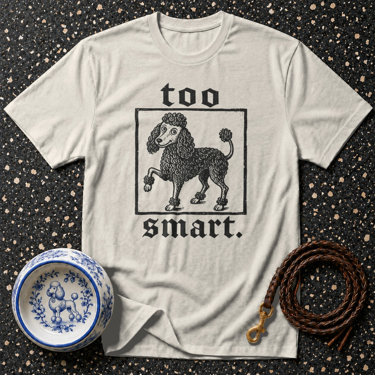 T-shirt with text "too smart." and a black and white poodle illustration.