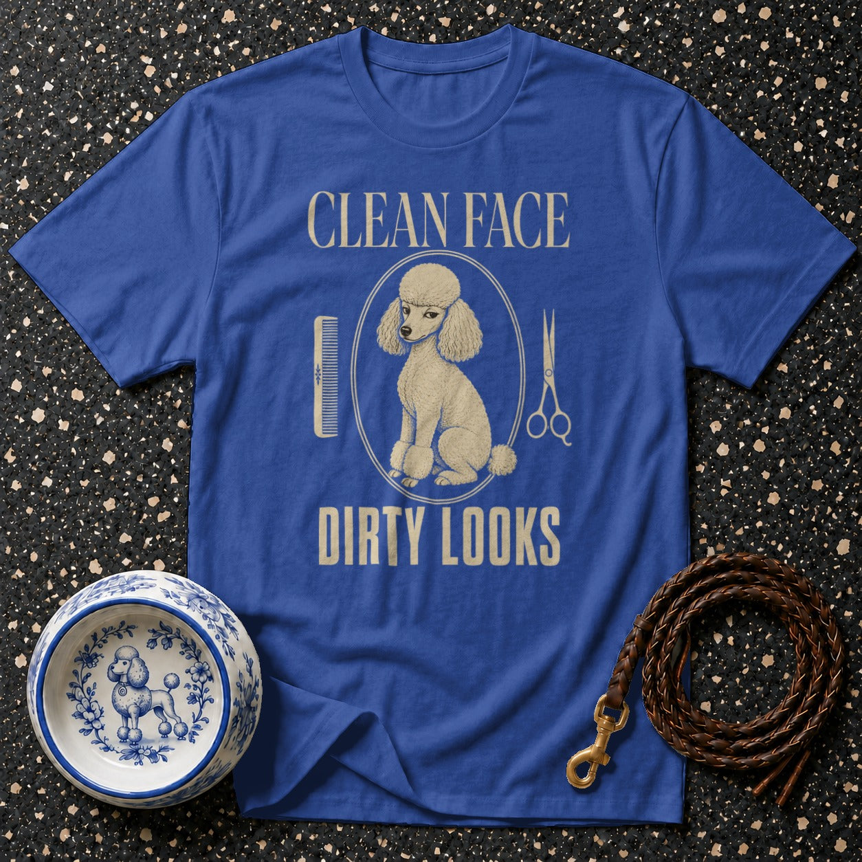 Blue t-shirt with a cream poodle graphic and text "CLEAN FACE DIRTY LOOKS."