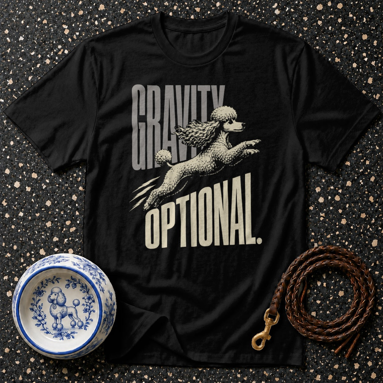 Black t-shirt with poodle jumping and text "GRAVITY OPTIONAL".
