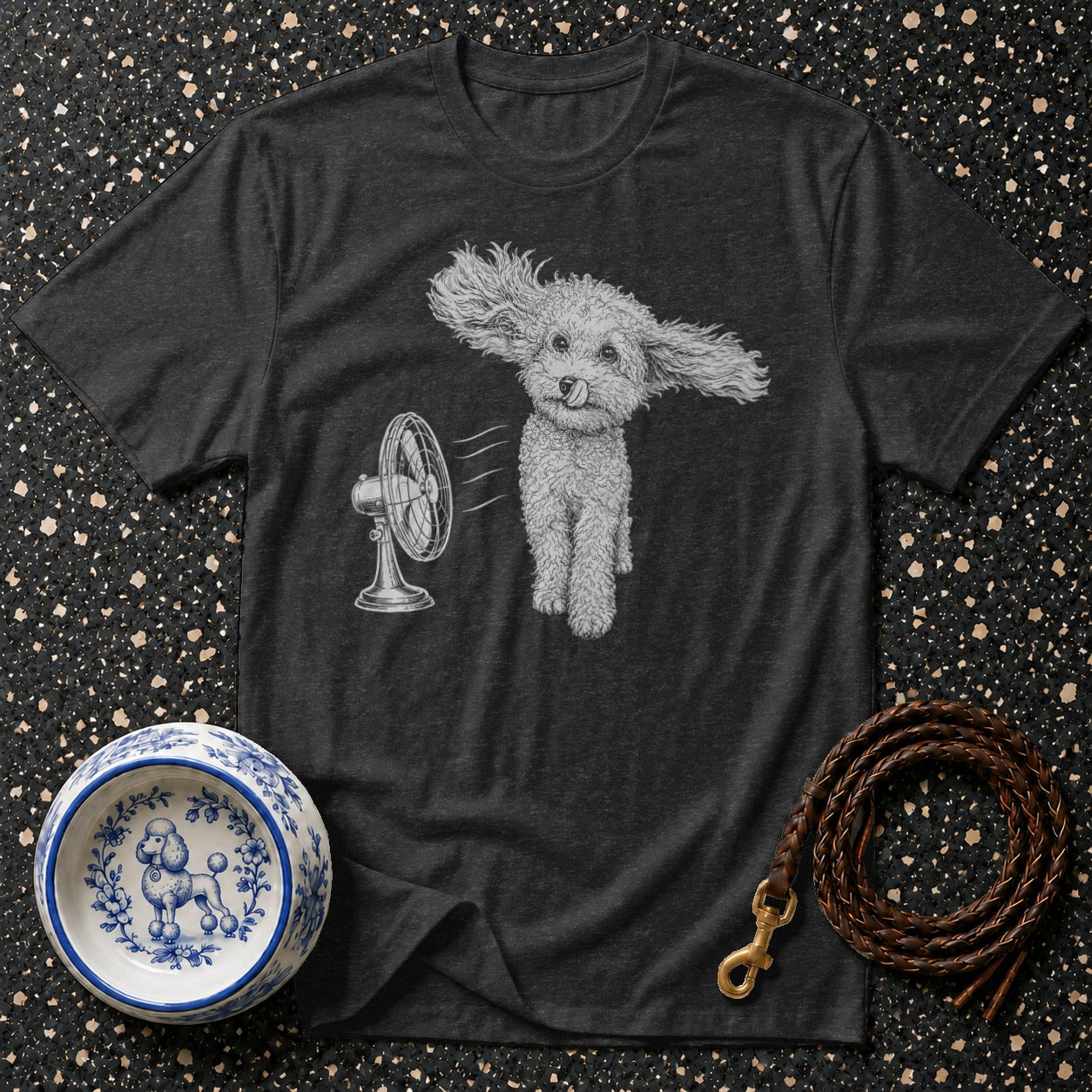 T-shirt with drawing of poodle with ears blowing in fan wind.