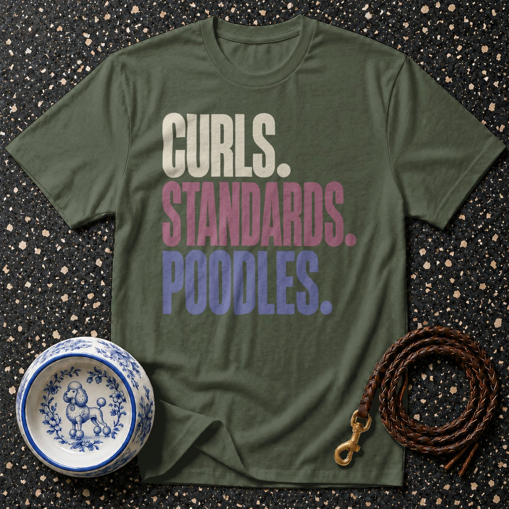 Green t-shirt with "CURls. STANDARDS. POODLES." text, a poodle dog bowl, and leash.