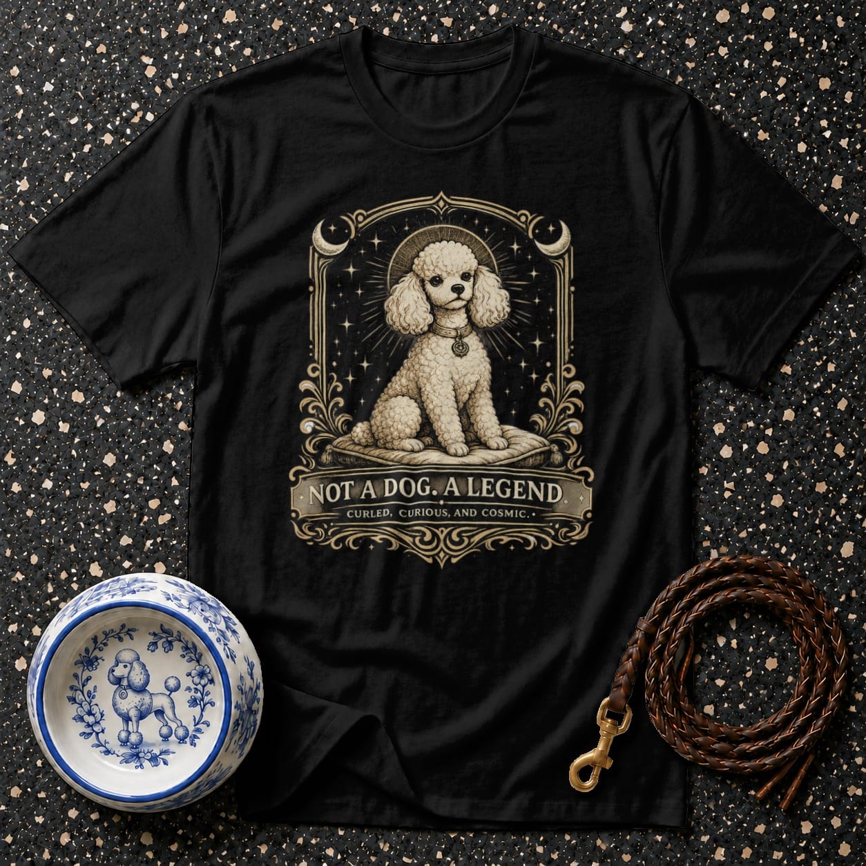 Black t-shirt with a stylized poodle design and text "Not a Dog. A Legend."