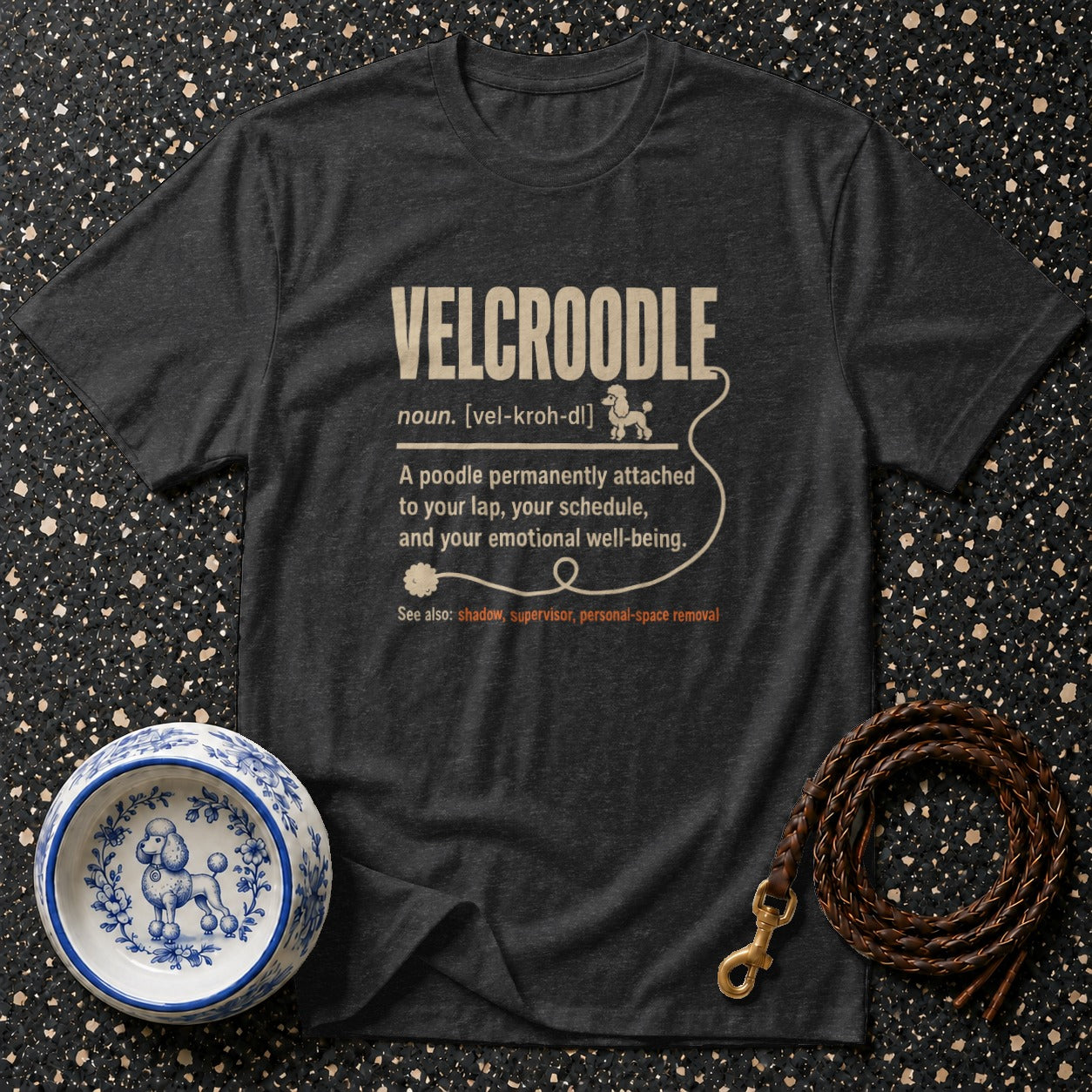 Dark gray t-shirt with "VELCROODLE" definition and poodle illustrations.