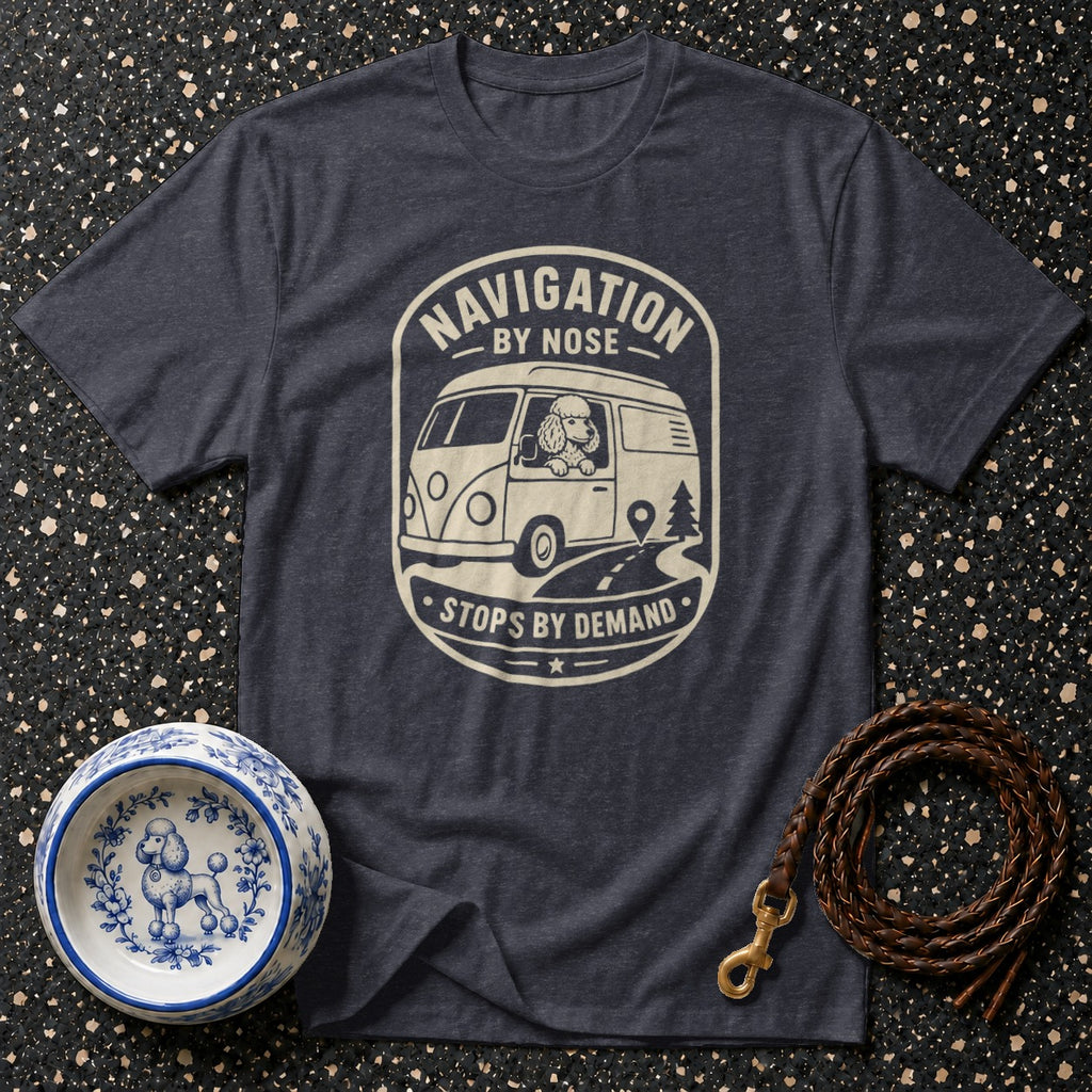 Dark grey t-shirt with graphic of a poodle in a van, text "Navigation by Nose Stops by Demand."