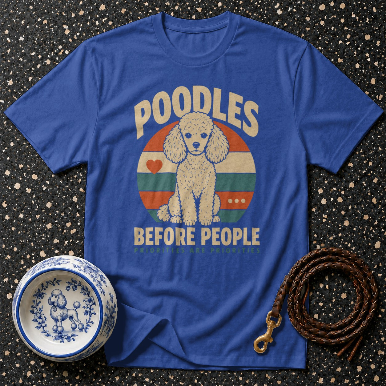 Royal blue t-shirt with a poodle graphic and "Poodles Before People" text.