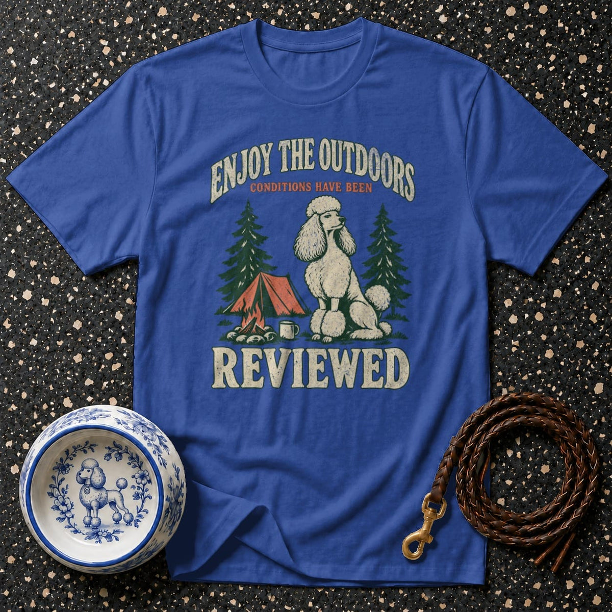 Blue t-shirt with "Enjoy the Outdoors Conditions Have Been Reviewed" text and poodle graphic.