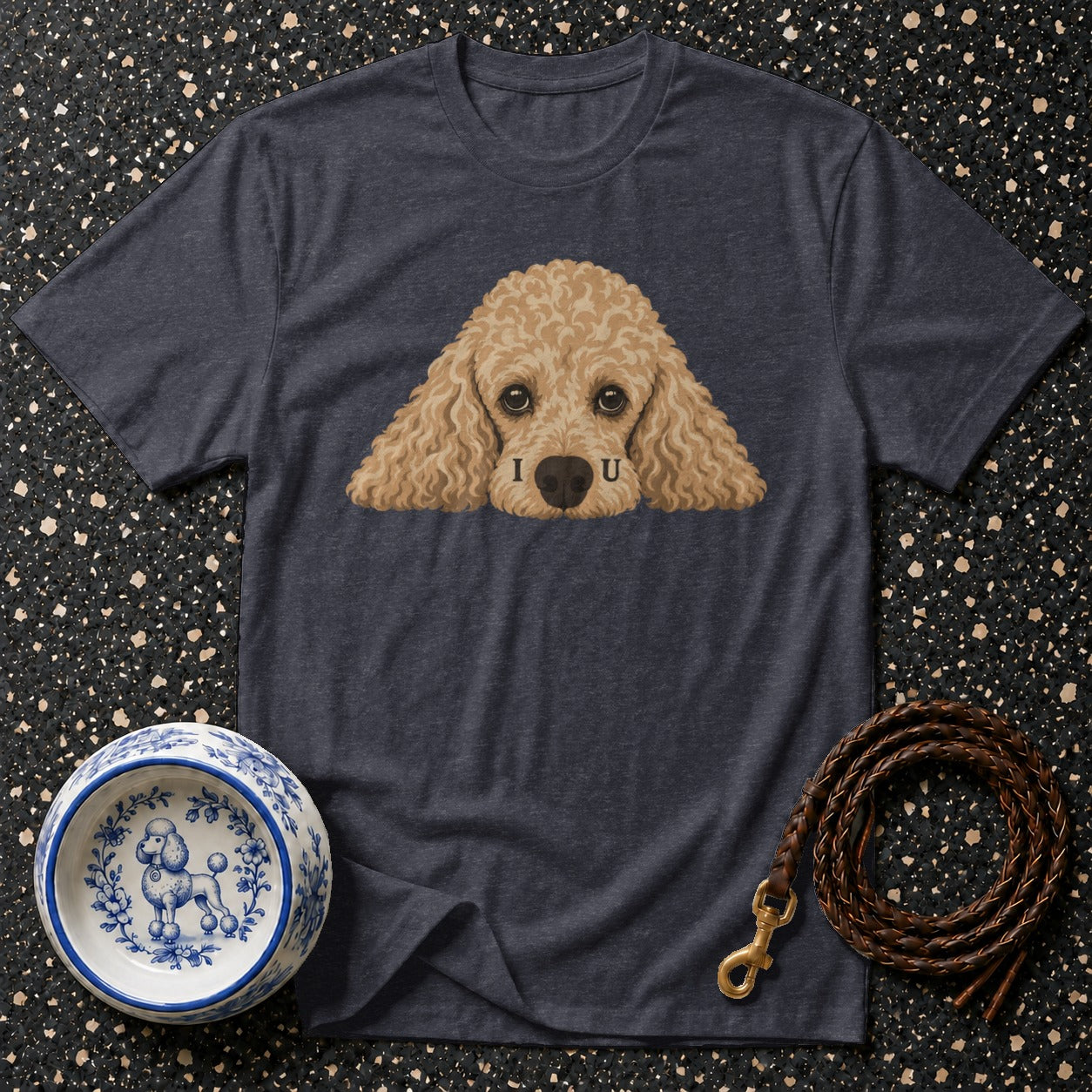 T-shirt with poodle graphic that reads "I U", dog bowl, and leather leash.