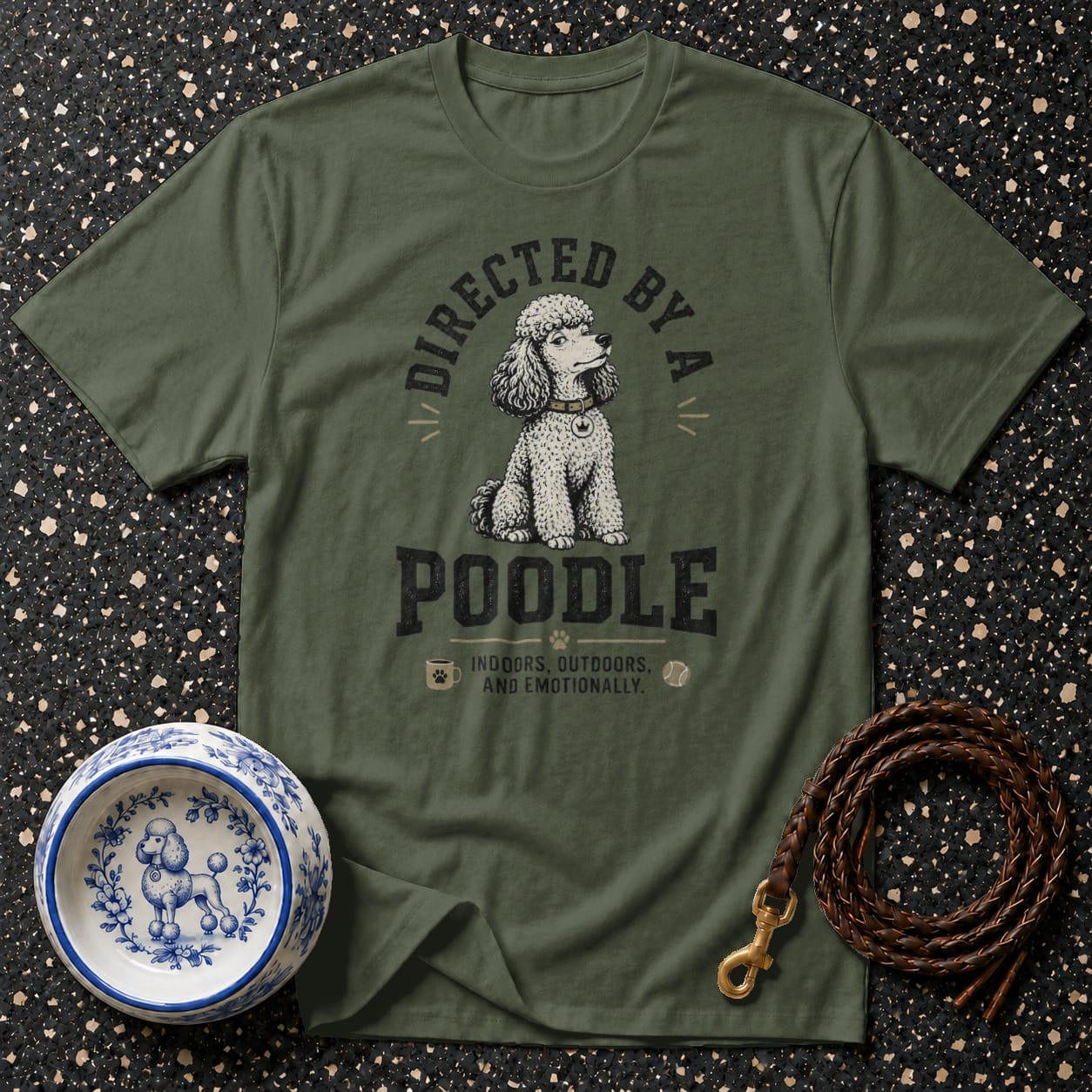 Olive green t-shirt with "Directed by a Poodle" graphics and poodle illustration.