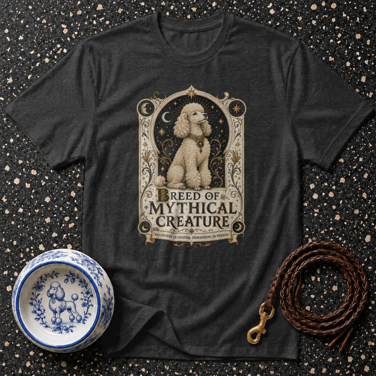 Dark t-shirt with a poodle illustration and "Breed of Mythical Creature" text.