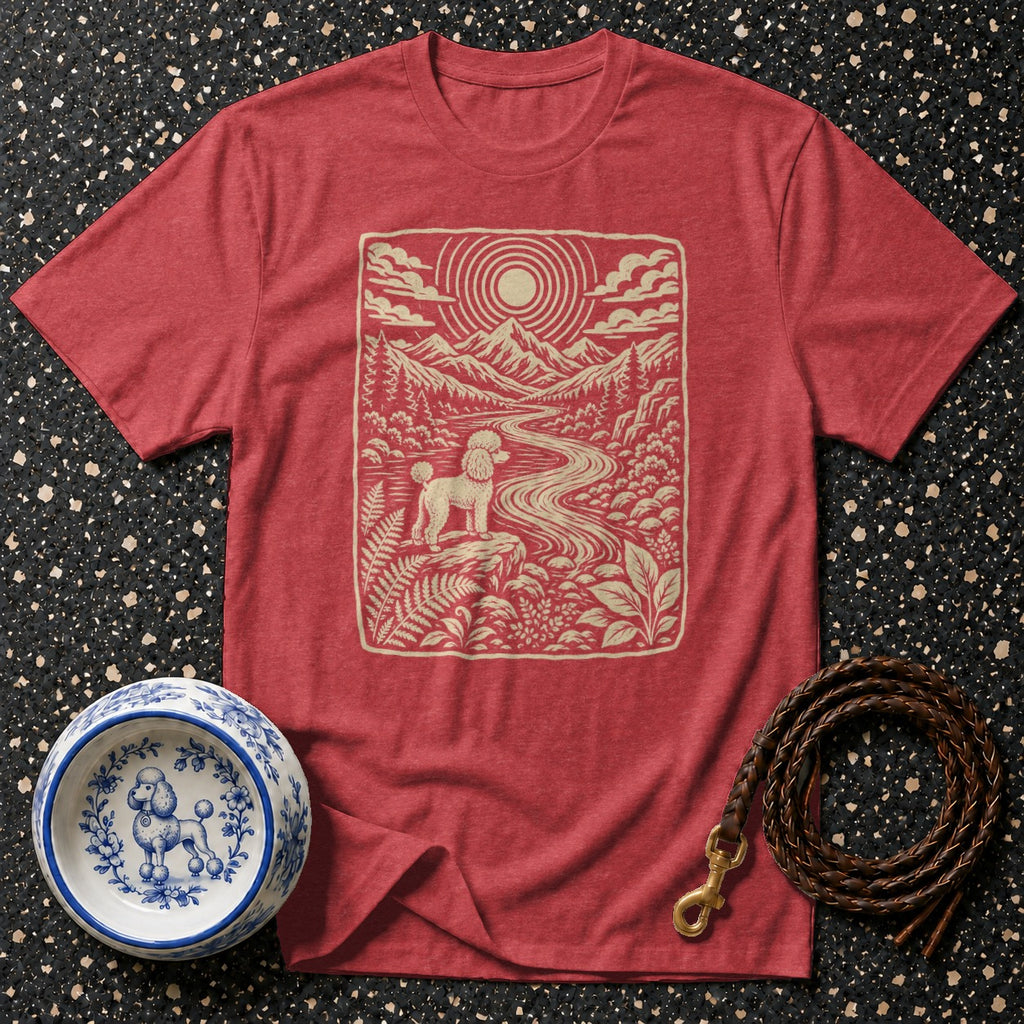 Red t-shirt with a graphic of a poodle in a mountain landscape.