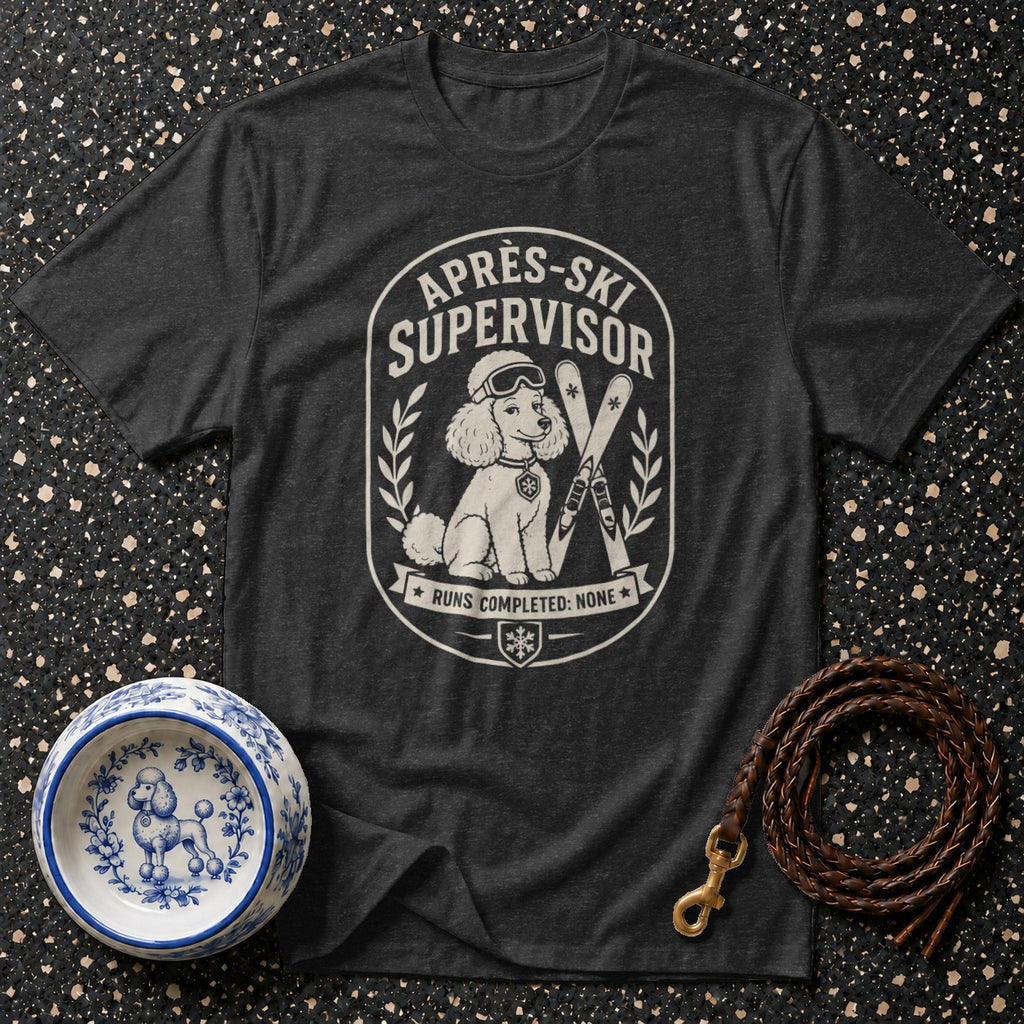 Dark grey t-shirt with "Aprés-Ski Supervisor" graphic of a poodle and skis.