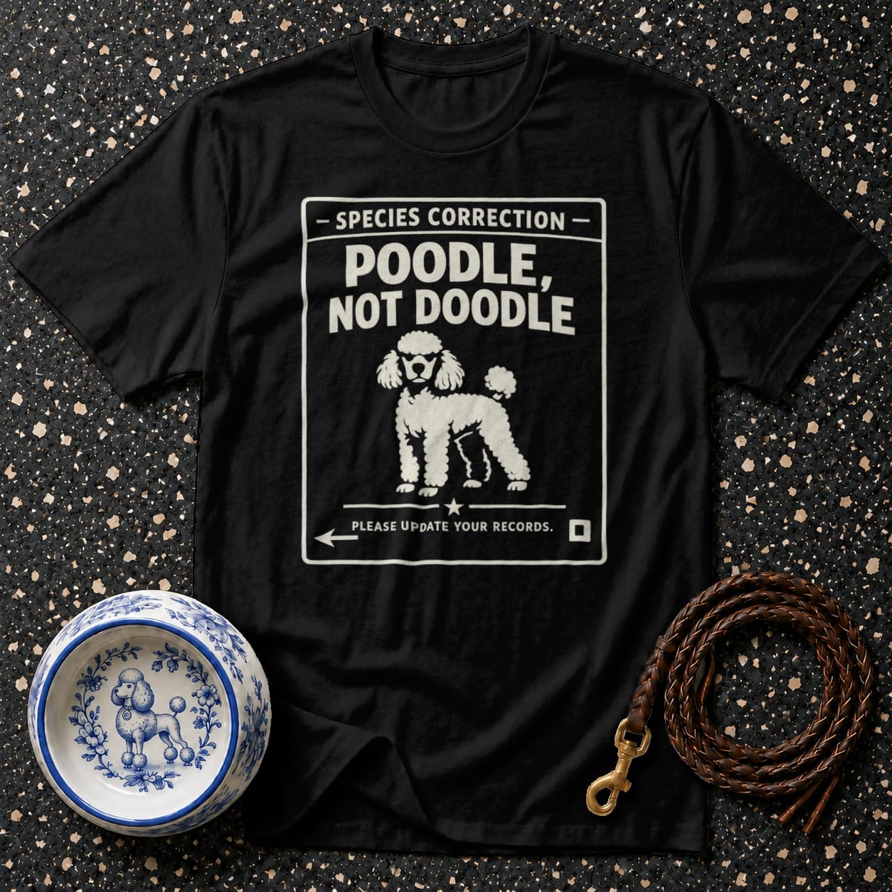 Black t-shirt with "Poodle, Not Doodle" text and poodle graphic.