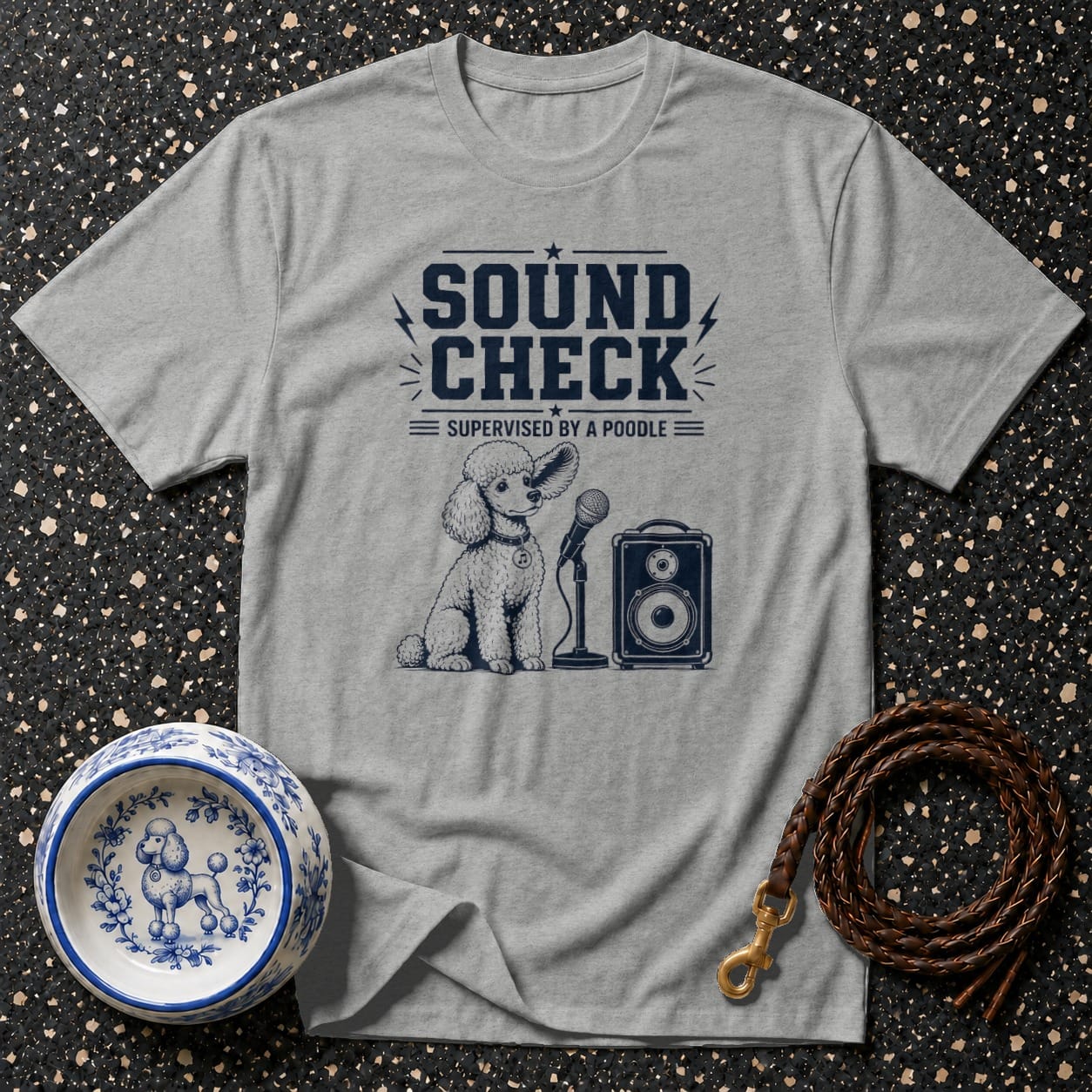 Grey t-shirt with "Sound Check Supervised by a Poodle" text and poodle graphic.