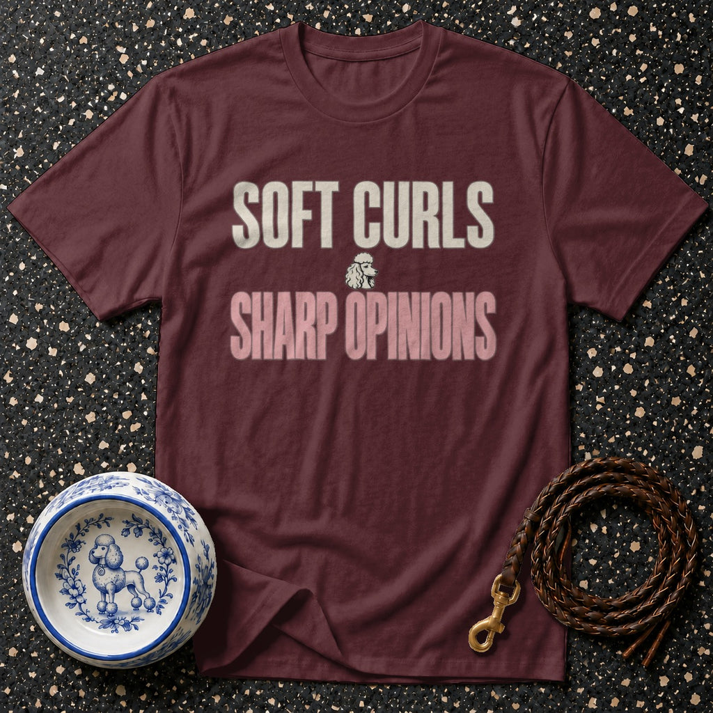 Maroon t-shirt with "Soft Curls Sharp Opinions" text and poodle graphic.