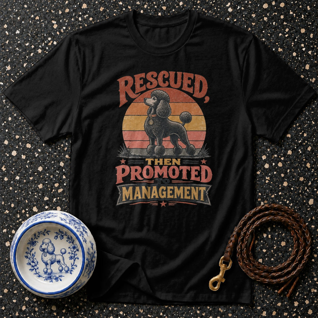 Black t-shirt with "Rescued, Then Promoted to Management" text and a poodle.