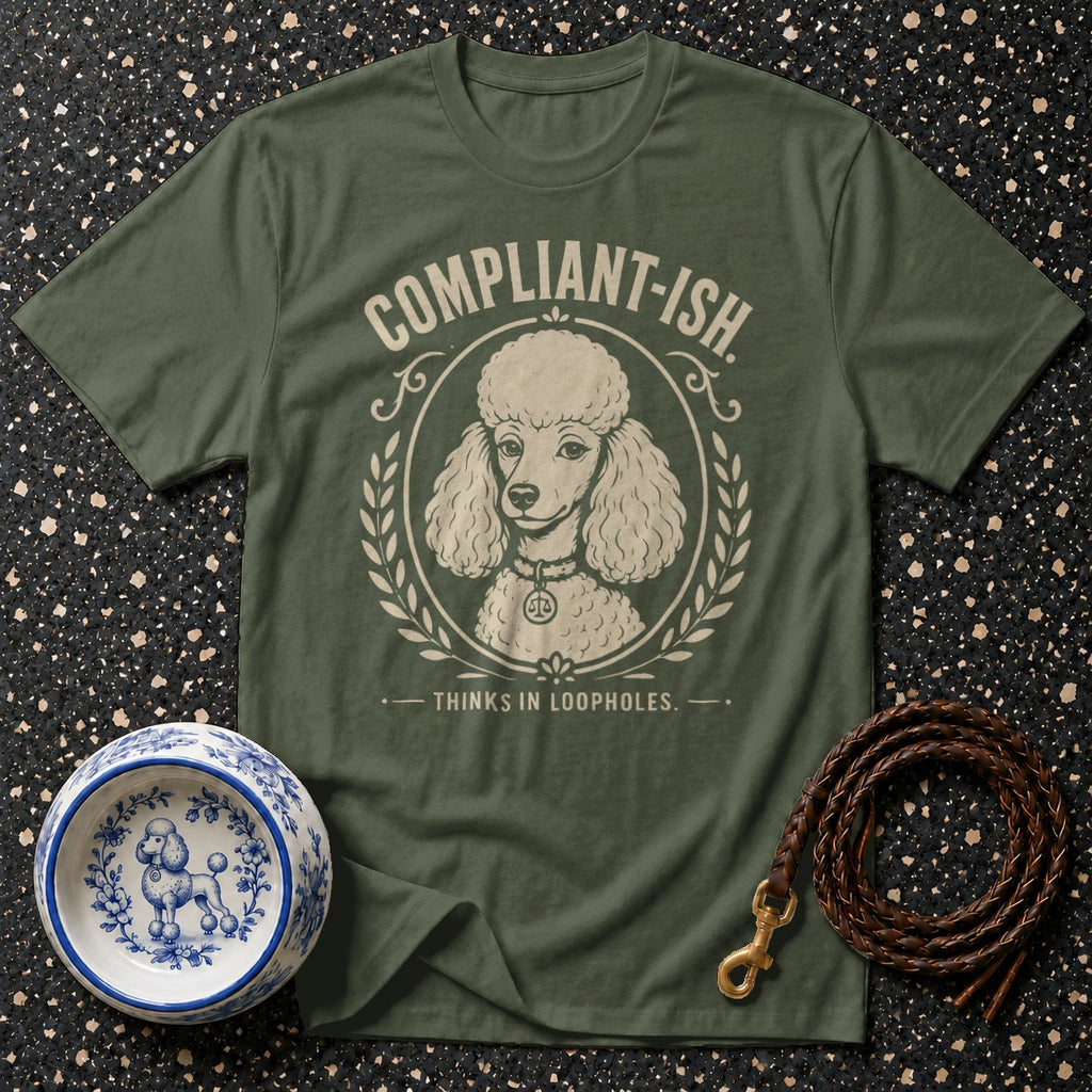 Green t-shirt with poodle graphic and text "COMPLIANT-ISH. THINKS IN LOOPHOLES."