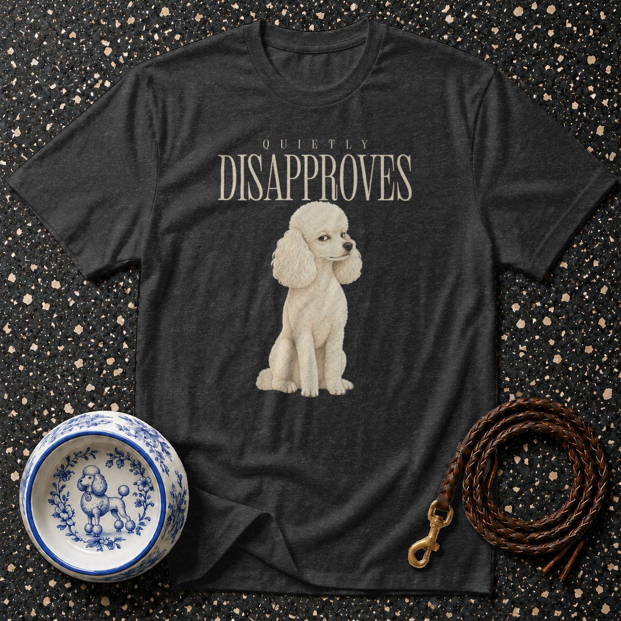 Dark grey t-shirt with a white poodle and "QUIETLY DISAPPROVES" text.