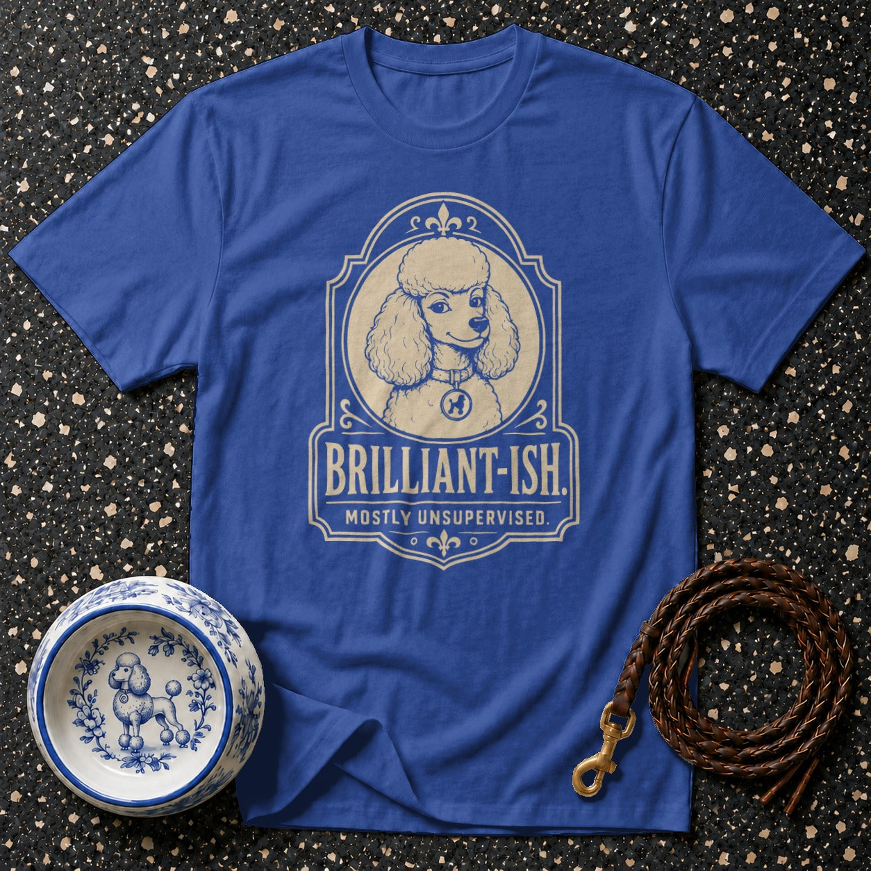 Blue t-shirt with a poodle graphic and text "BRILLIANT-ISH. MOSTLY UNSUPERVISED."