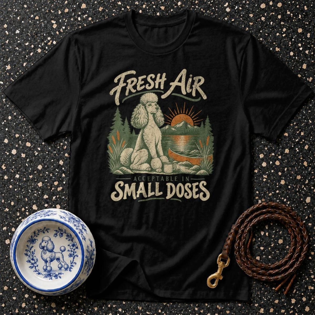 Black t-shirt with poodle, canoe, mountains, and text "Fresh Air Acceptable in Small Doses."