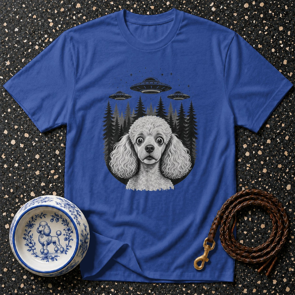 T-shirt with poodle, UFOs, and trees graphic design.