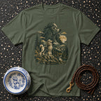 Green t-shirt with a graphic of two poodles in a moonlit mountain forest scene.