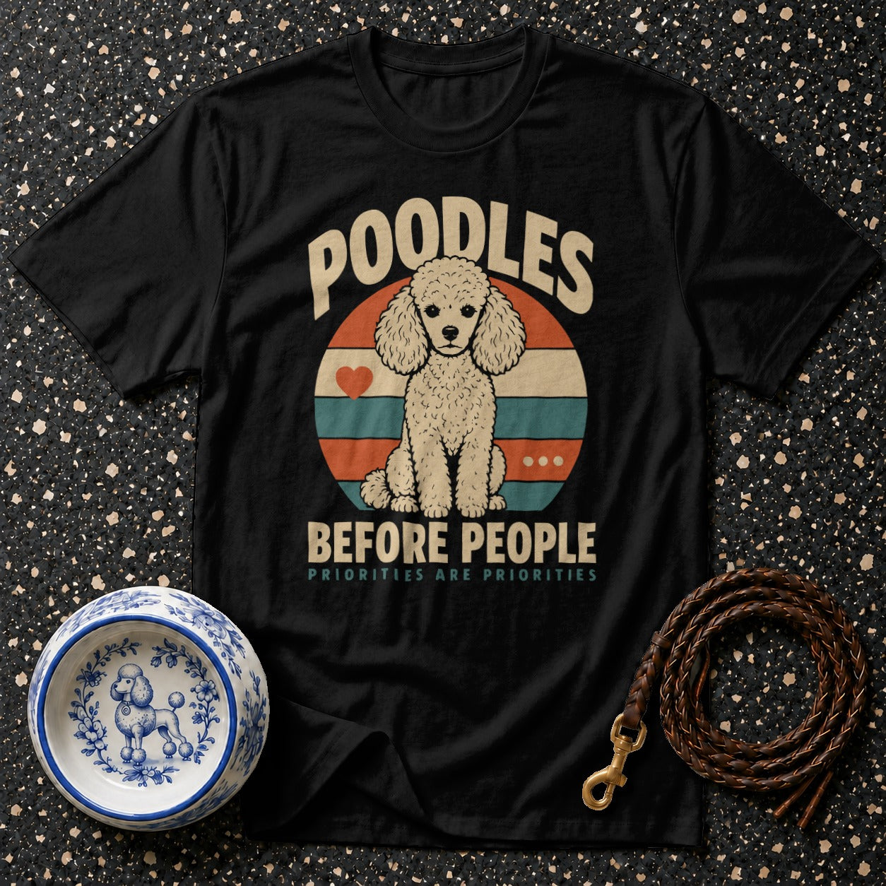 Black t-shirt with a poodle graphic and text "Poodles Before People".