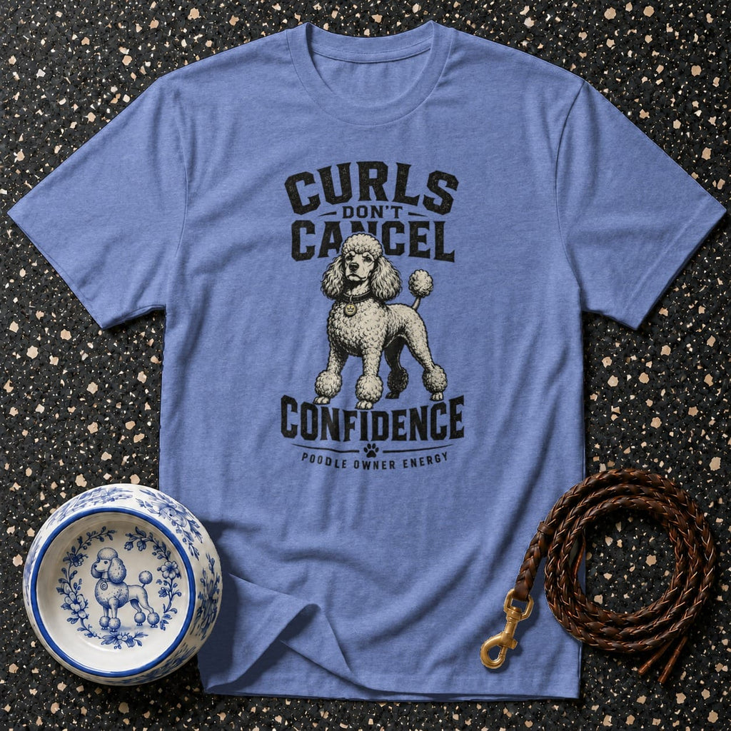 Blue t-shirt with a poodle graphic and text "Curls Don't Cancel Confidence".