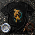 Black t-shirt with a large golden poodle face over a forest scene with moon and waterfall.