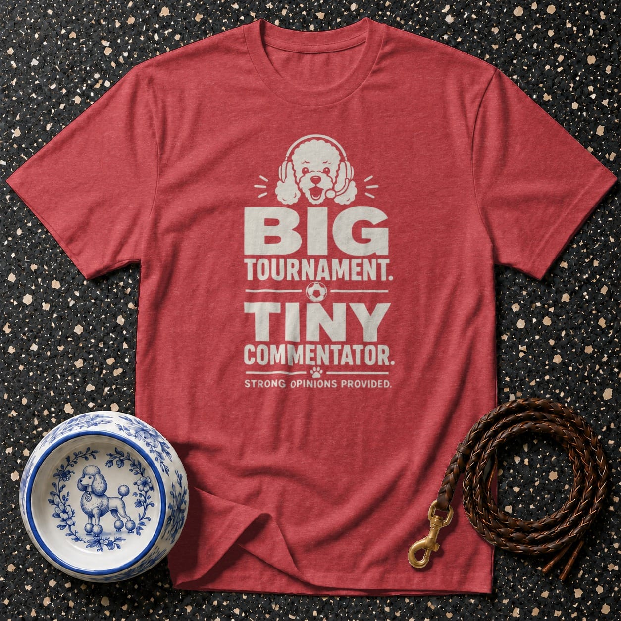 Red t-shirt with "BIG TOURNAMENT. TINY COMMENTATOR." text and poodle wearing headphones.