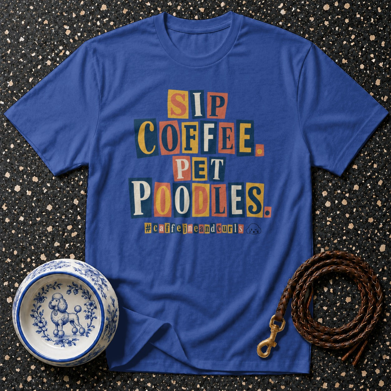 Blue t-shirt with text "Sip Coffee Pet Poodles" and "#caffeineandcurls".