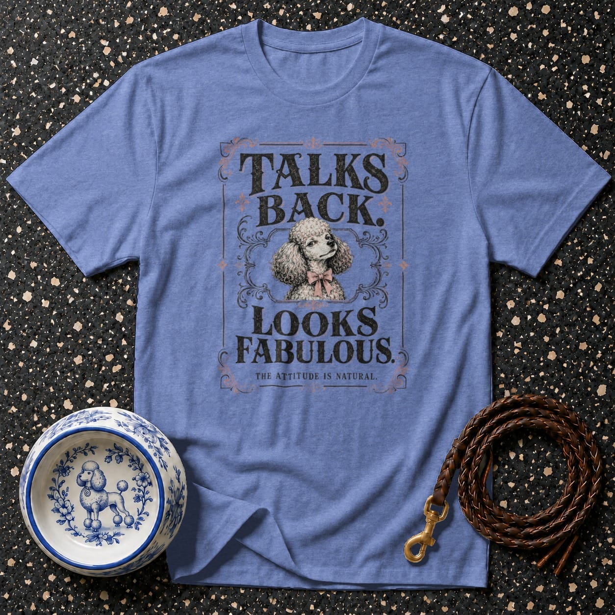 Blue t-shirt with "Talks Back. Looks Fabulous." and a poodle graphic.