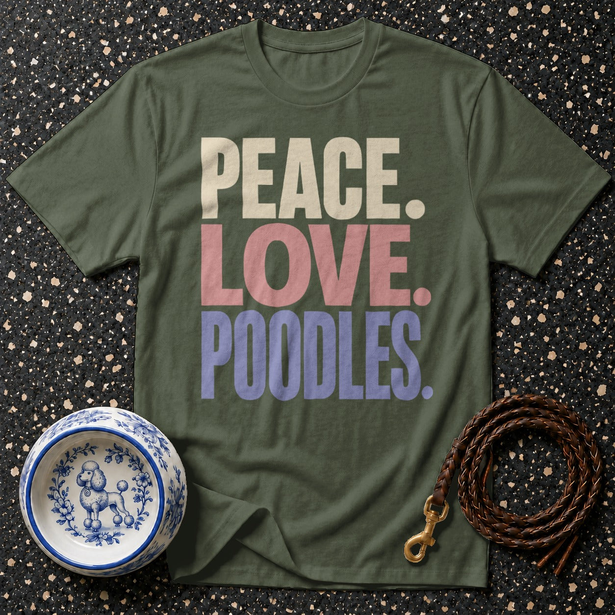 Green t-shirt with "PEACE. LOVE. POODLES." text, a dog bowl, and a leash.